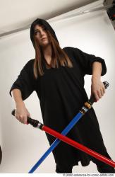 ANGELIA STANDING POSE WITH LIGHTSABERS